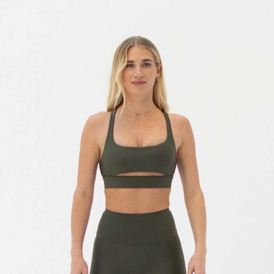 Green front slit sports bra made from recycled plastic bottles