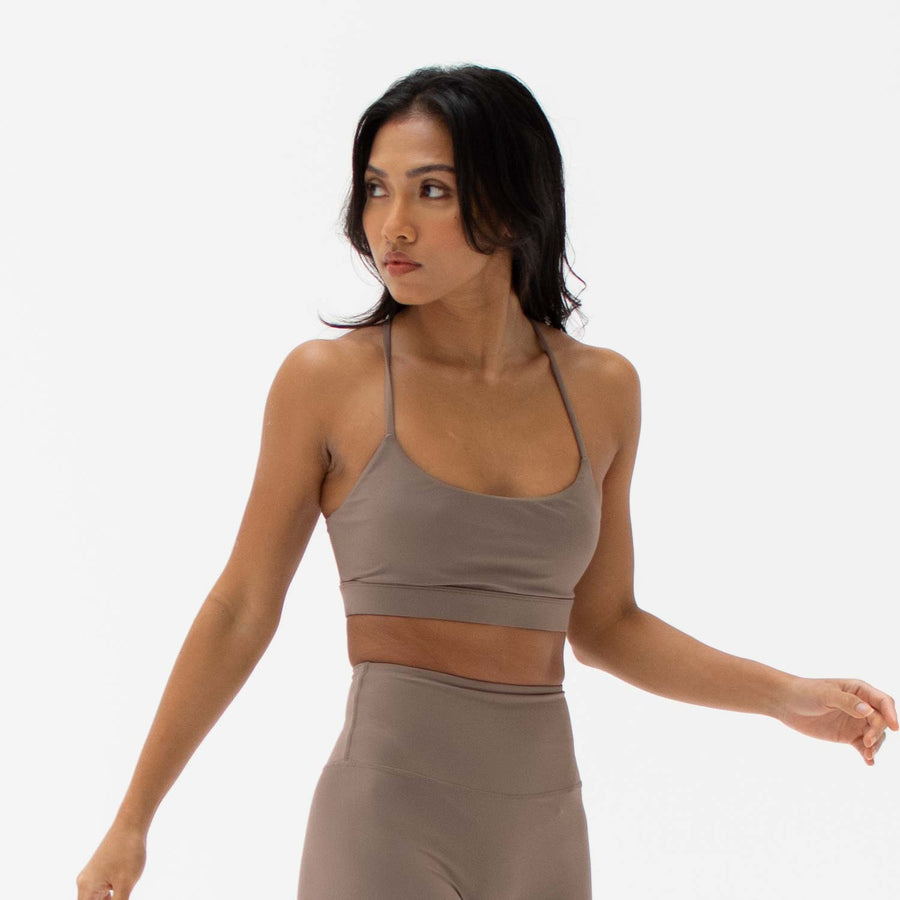Brown scoop neck sports bra made from recycled plastic bottles