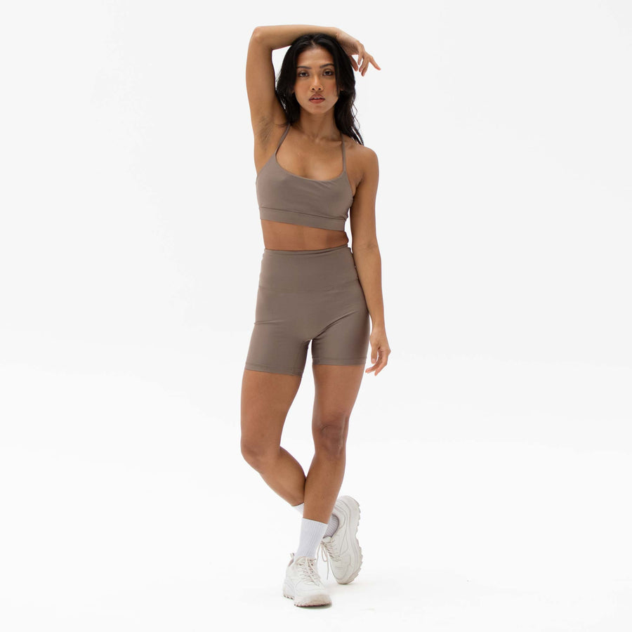 Brown sustainable activewear shorts made from recycled plastic bottles