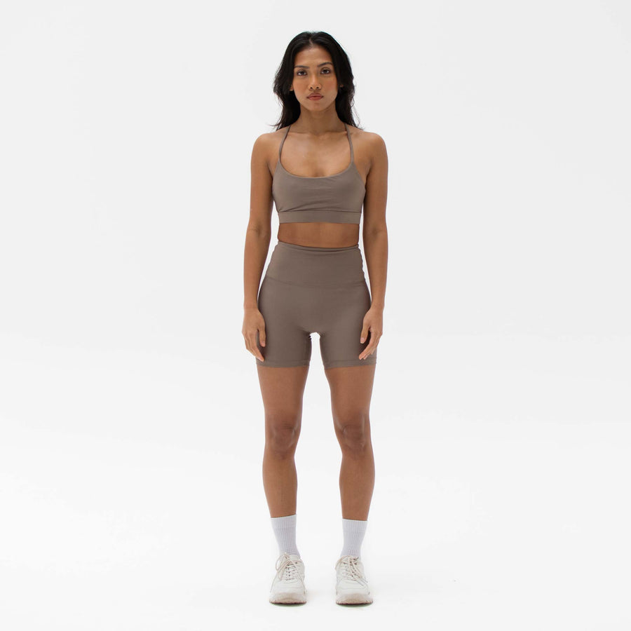 Brown sustainable activewear shorts made from recycled plastic bottles