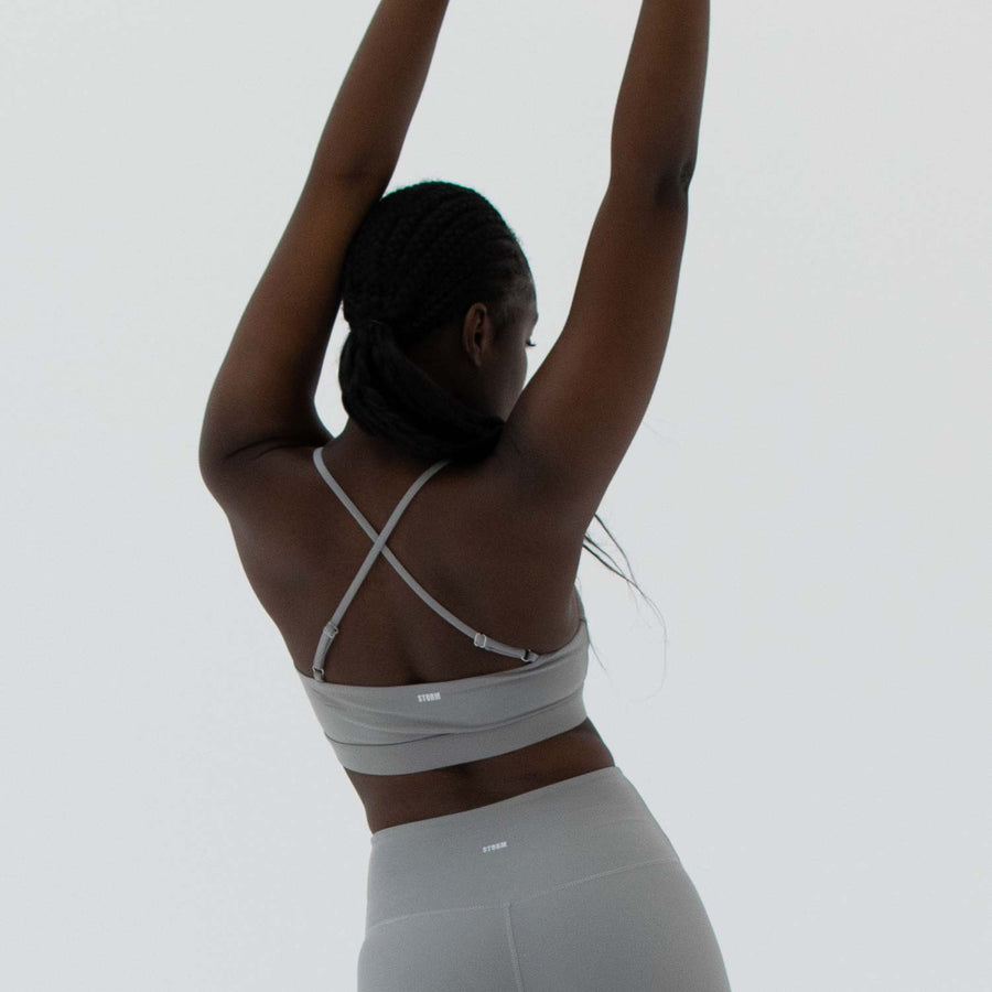 Grey scoop neck sports bra made from recycled plastic bottles