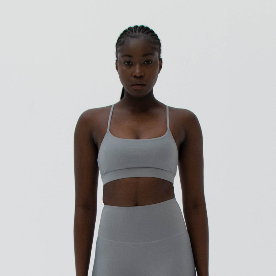 Grey scoop neck sports bra made from recycled plastic bottles