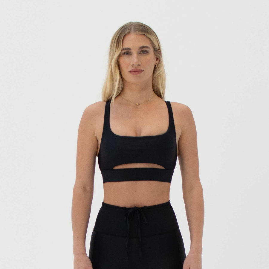 Black front slit sports bra made from recycled plastic bottles