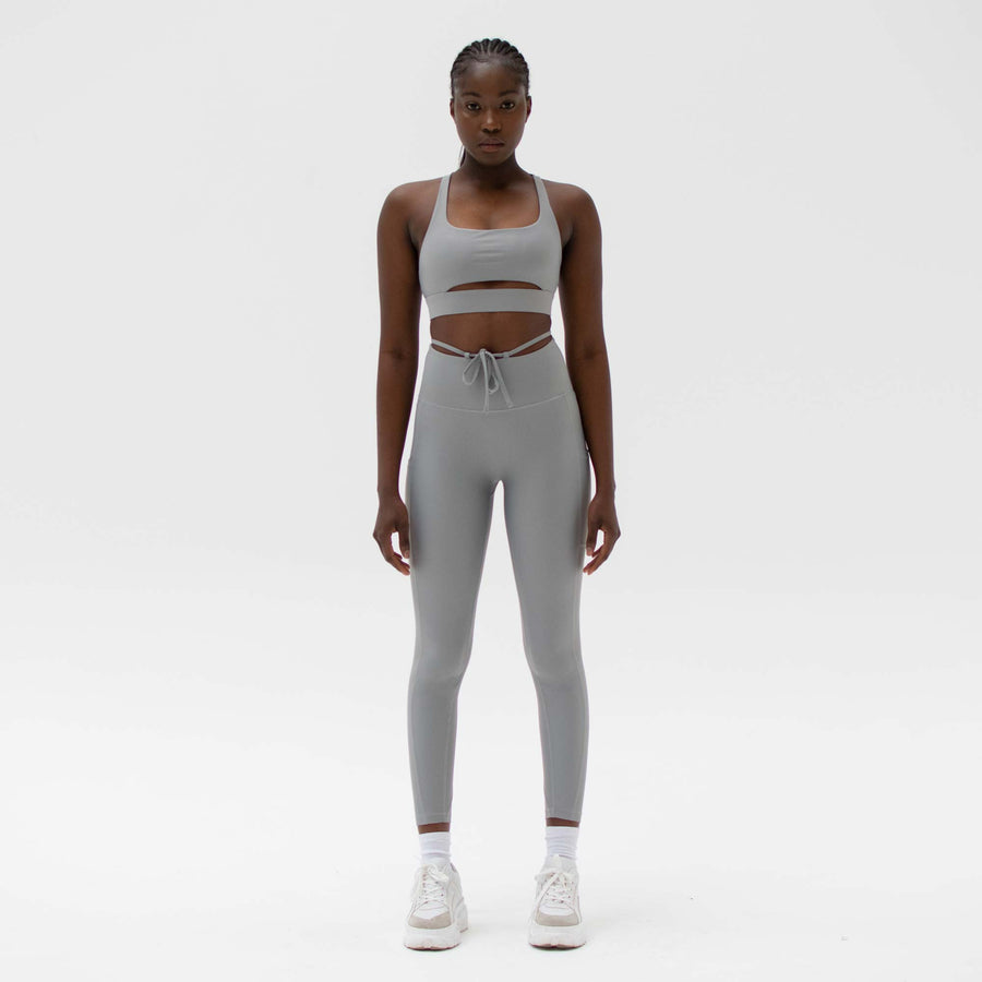 Grey activewear leggings with ties made from recycled plastic bottles