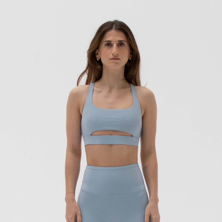 Blue front slit sports bra made from recycled plastic bottles