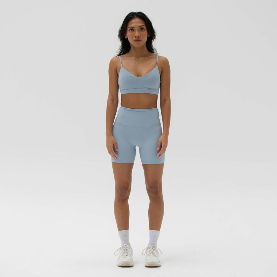 Blue sustainable activewear shorts made from recycled plastic bottles