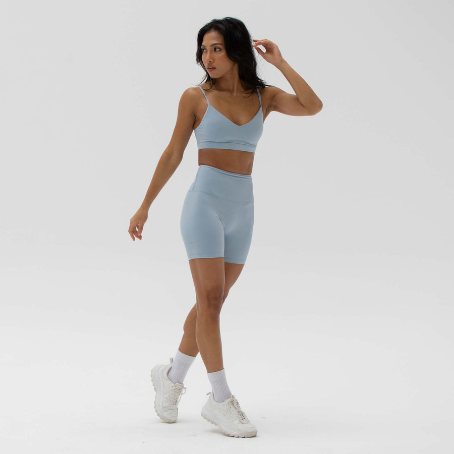 Blue sustainable activewear shorts made from recycled plastic bottles