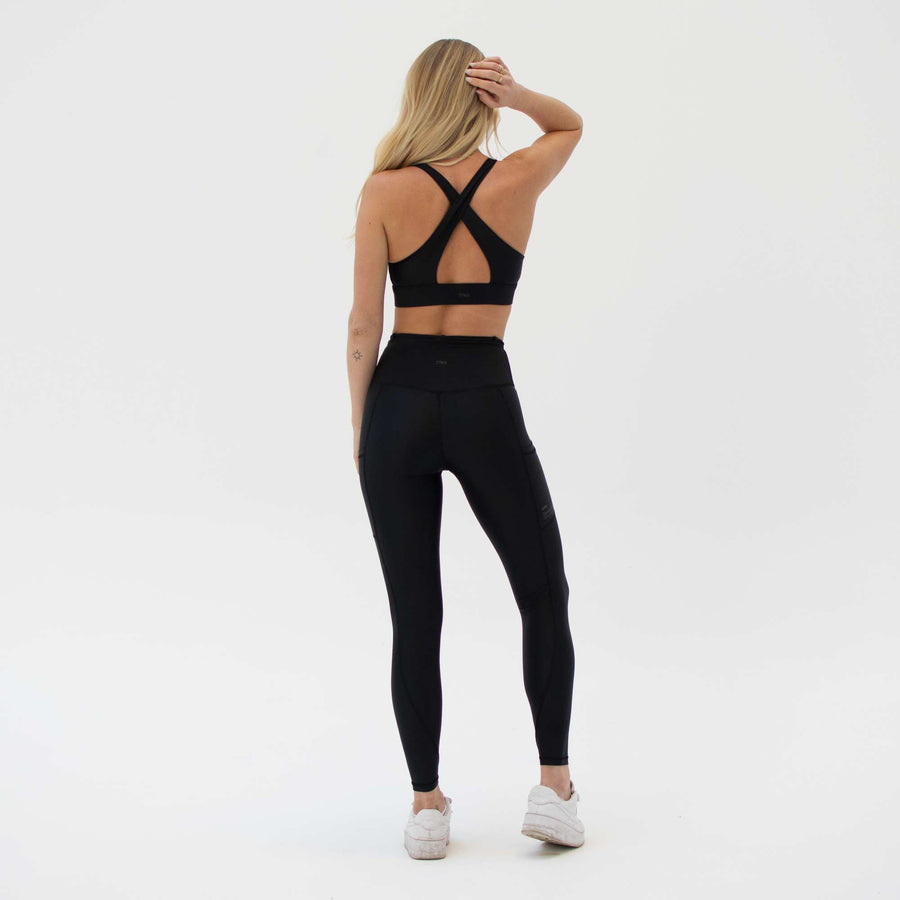 Black activewear leggings with ties made from recycled plastic bottles