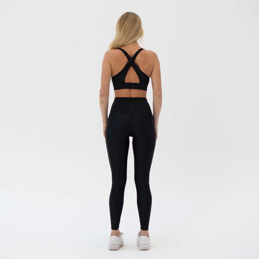 Black activewear leggings with ties made from recycled plastic bottles